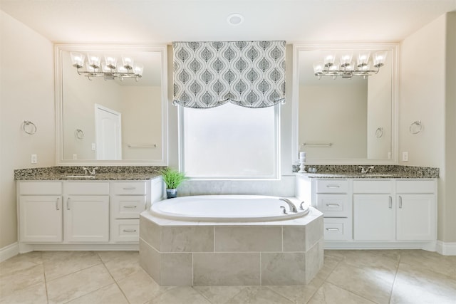 20207 Desert Foal Dr, Tomball, TX 77377 - bathroom with tile patterned flooring, a bath, and two vanities
