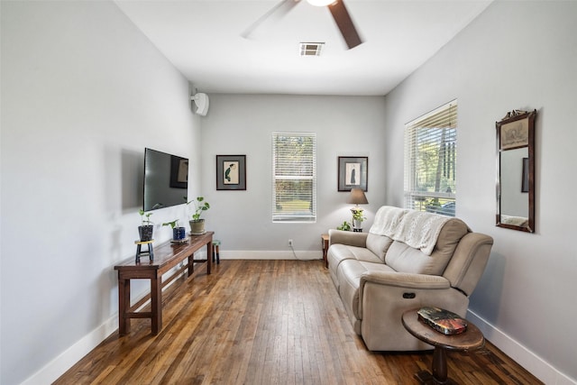 275 Pashun Ln, New Waverly, TX 77358 - living room featuring wood-type flooring, plenty of natural light, and visible vents