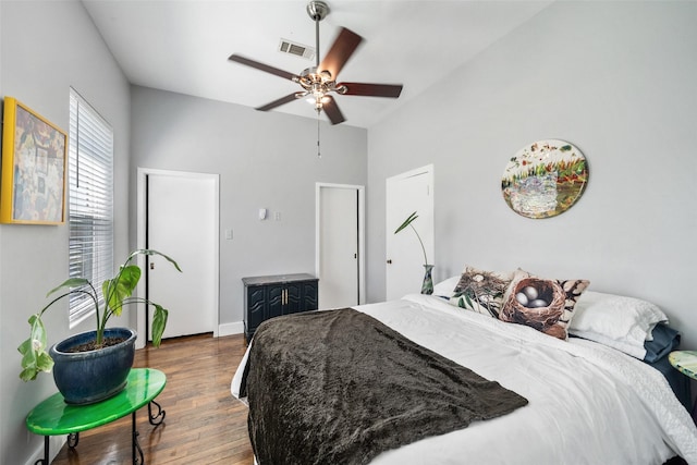 275 Pashun Ln, New Waverly, TX 77358 - bedroom with visible vents, baseboards, wood finished floors, and ceiling fan