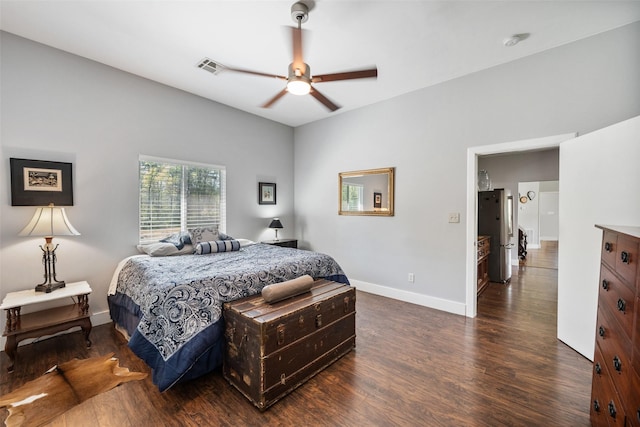 275 Pashun Ln, New Waverly, TX 77358 - bedroom featuring a ceiling fan, baseboards, dark wood-style flooring, and visible vents