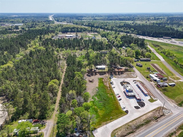 275 Pashun Ln, New Waverly, TX 77358 - birds eye view of property featuring a forest view