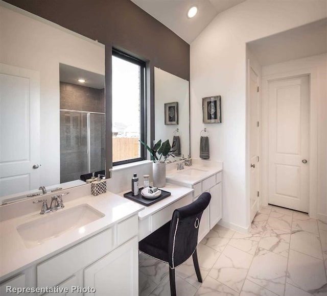 bathroom featuring recessed lighting, a sink, marble finish floor, and a stall shower