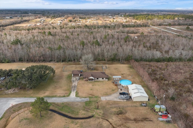 birds eye view of property featuring a rural view