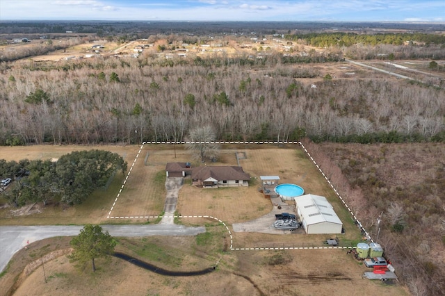 birds eye view of property featuring a rural view