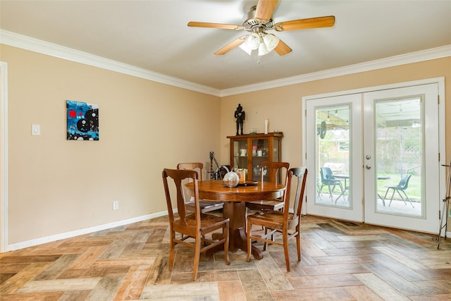 dining area with baseboards, ornamental molding, french doors, and ceiling fan
