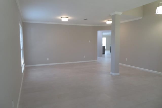1606 Caslyn Dr, Rosenberg, TX 77471 - spare room featuring ornamental molding and baseboards