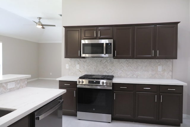 1606 Caslyn Dr, Rosenberg, TX 77471 - kitchen with appliances with stainless steel finishes, tasteful backsplash, ceiling fan, dark brown cabinetry, and crown molding