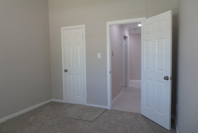 1606 Caslyn Dr, Rosenberg, TX 77471 - empty room with light colored carpet and baseboards