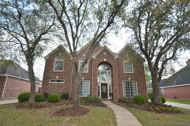 4242 Noble Oak Trl, Houston, TX 77059 - traditional-style home featuring brick siding and a front yard