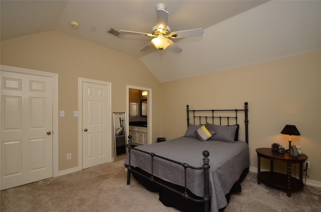 4242 Noble Oak Trl, Houston, TX 77059 - bedroom featuring vaulted ceiling, light carpet, ceiling fan, ensuite bathroom, and baseboards