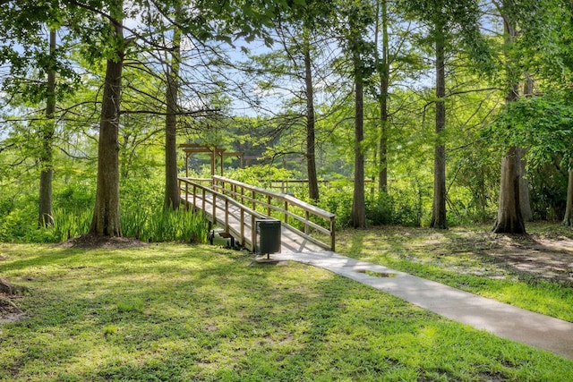 4242 Noble Oak Trl, Houston, TX 77059 - view of property's community with a lawn