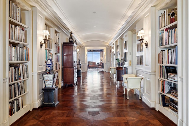 2121 Kirby Dr Unit 12N, Houston, TX 77019 - hallway with built in shelves, lofted ceiling, and crown molding