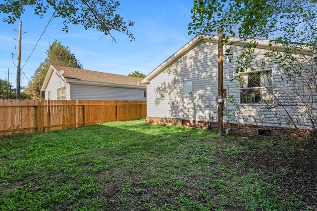 view of yard with fence