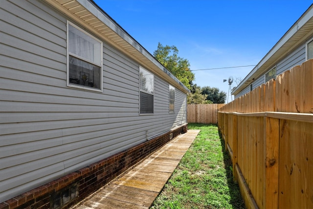 view of property exterior featuring fence