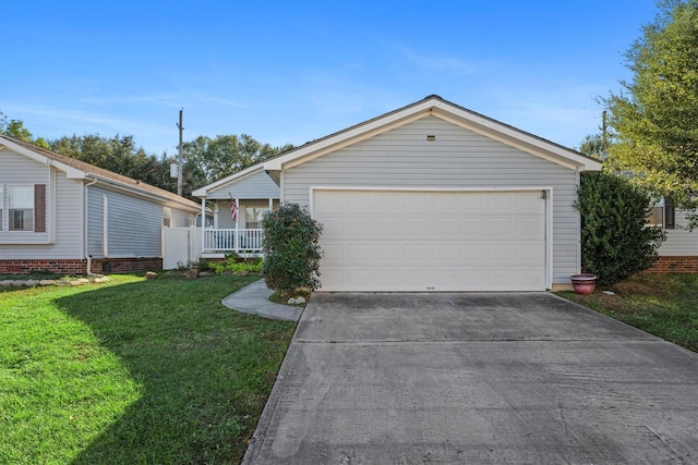 ranch-style house featuring concrete driveway, covered porch, and a front lawn