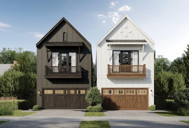 modern inspired farmhouse featuring board and batten siding, a standing seam roof, a garage, a balcony, and concrete driveway
