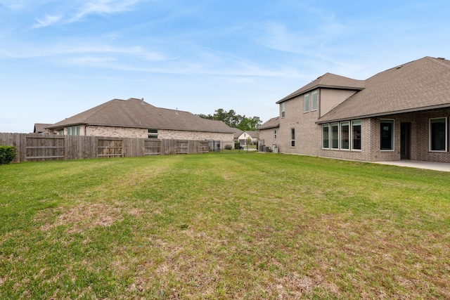 view of yard featuring a patio area and fence private yard