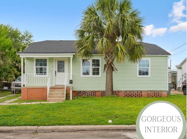 view of front of home featuring a shingled roof, a porch, a front lawn, and crawl space