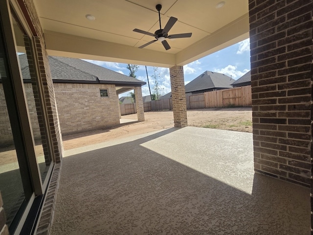 21877 Colorado Bend Ln, Porter, TX 77365 - fenced backyard featuring a patio and a ceiling fan
