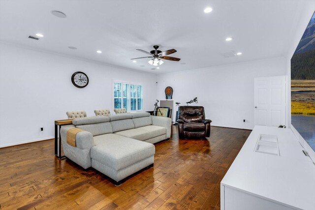 living room with visible vents, recessed lighting, a ceiling fan, and dark wood finished floors