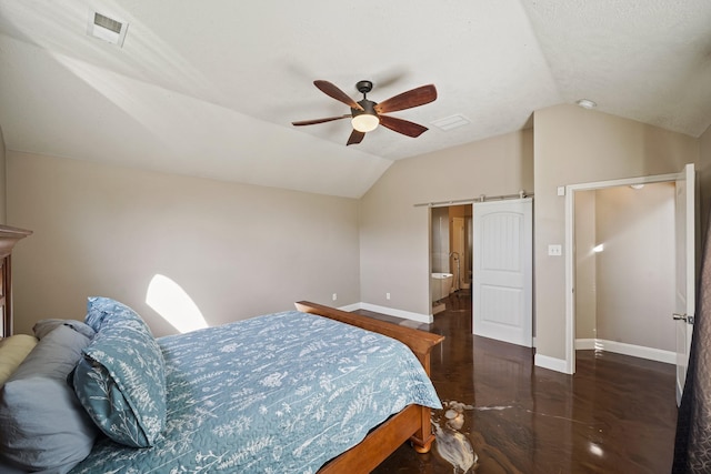 10515 Wind Walker Trl, Houston, TX 77095 - bedroom featuring lofted ceiling, a ceiling fan, a barn door, baseboards, and visible vents