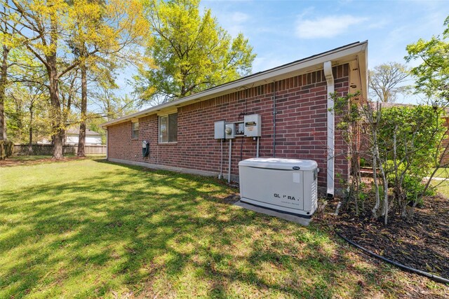 7014 Woodland Oaks, Magnolia, TX 77354 - view of home's exterior with brick siding