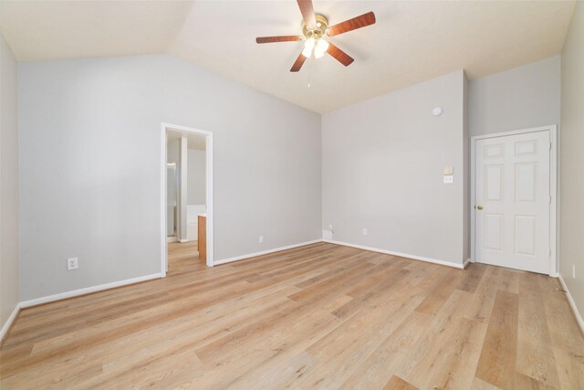 7014 Woodland Oaks, Magnolia, TX 77354 - empty room with a ceiling fan, light wood-type flooring, baseboards, and vaulted ceiling