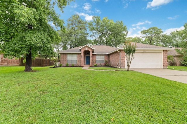 7014 Woodland Oaks, Magnolia, TX 77354 - view of front facade with a garage, concrete driveway, and brick siding