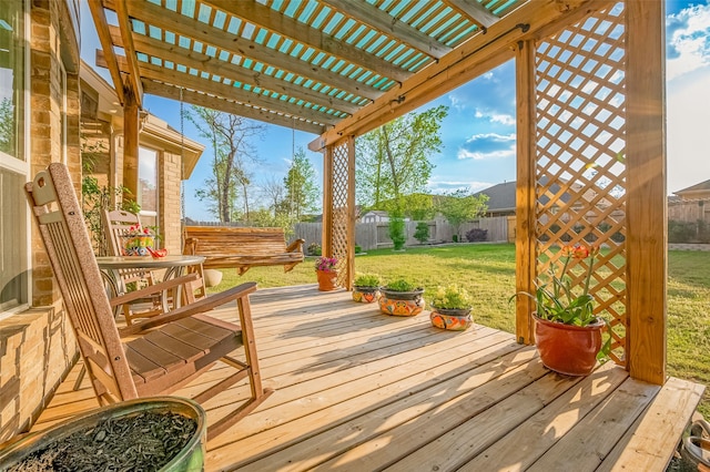 wooden terrace featuring a pergola, a yard, and a fenced backyard