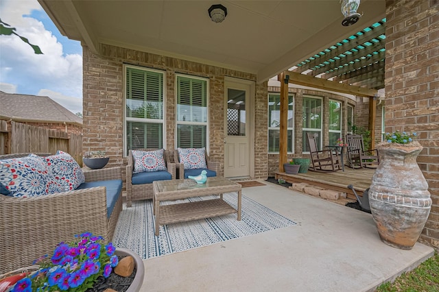 view of patio / terrace with a pergola, fence, and an outdoor hangout area