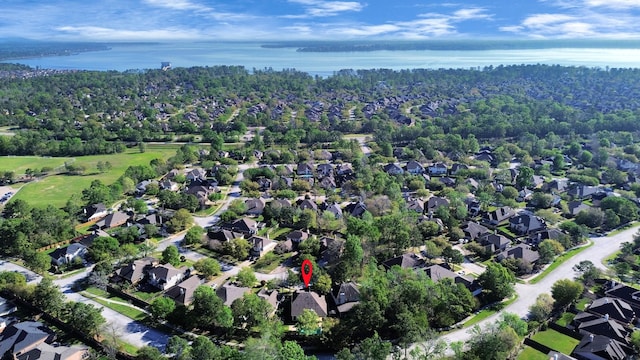 aerial view with a residential view and a water view