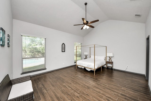 bedroom featuring wood finished floors, baseboards, multiple windows, and visible vents