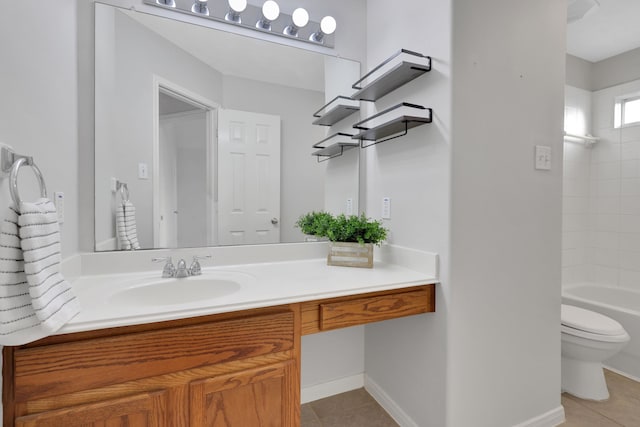 full bath featuring baseboards, toilet, tile patterned floors, vanity, and bathing tub / shower combination