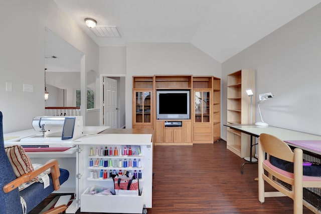 home office with dark wood-style flooring, visible vents, and vaulted ceiling