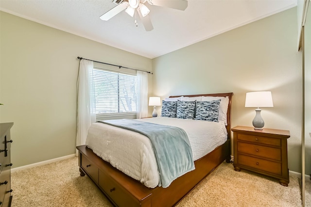 307 Crestwood Dr, El Lago, TX 77586 - bedroom with baseboards, ceiling fan, and light carpet