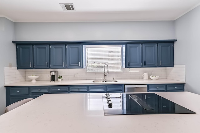 307 Crestwood Dr, El Lago, TX 77586 - kitchen featuring stainless steel dishwasher, blue cabinets, and a sink