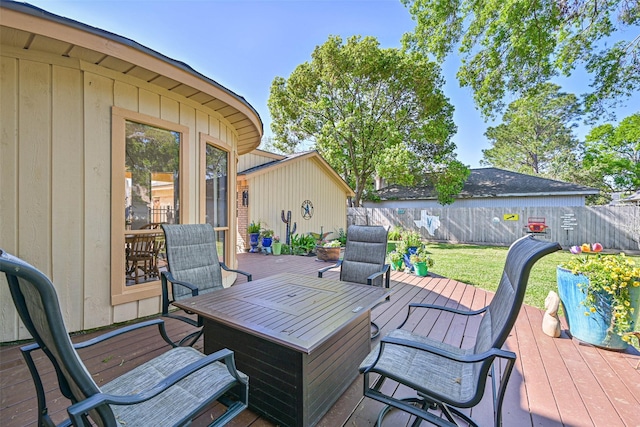 307 Crestwood Dr, El Lago, TX 77586 - wooden terrace with a fenced backyard and a lawn