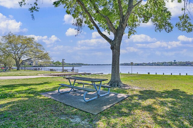 307 Crestwood Dr, El Lago, TX 77586 - view of property's community featuring a lawn and a water view