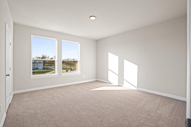 1922 Peacock Isle Dr, Dickinson, TX 77539 - spare room with light colored carpet and baseboards