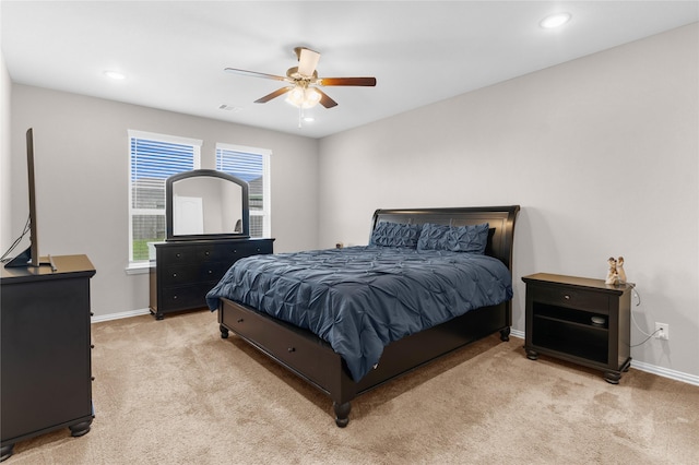 bedroom with visible vents, baseboards, recessed lighting, a ceiling fan, and light carpet