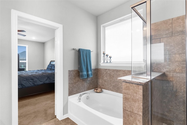bathroom with a stall shower, tile patterned floors, ensuite bath, and a garden tub