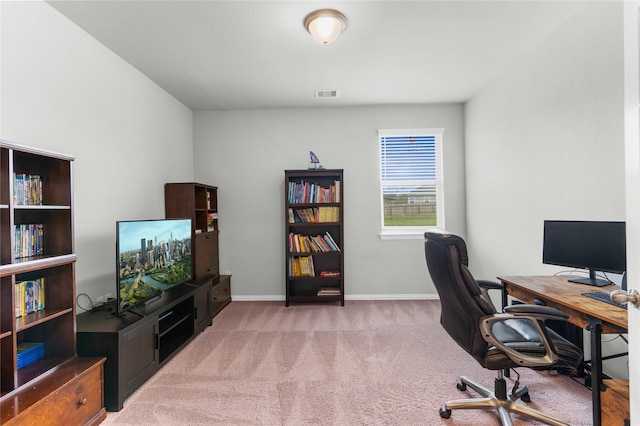 office area featuring baseboards, visible vents, and carpet flooring