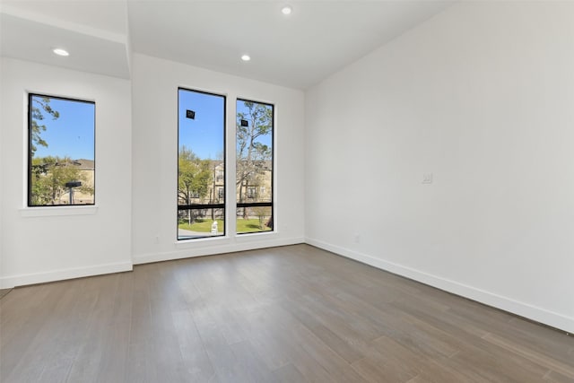 12838 Verdi Dr, Houston, TX 77024 - empty room with plenty of natural light and dark wood-style floors