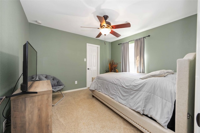 6226 Oxford Lake Dr, Rosenberg, TX 77471 - bedroom with carpet flooring, baseboards, and a ceiling fan