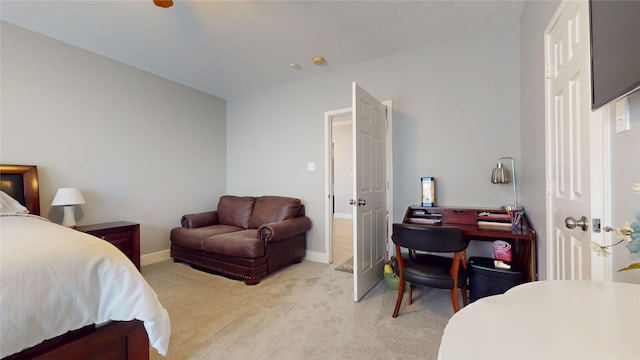 bedroom with light carpet, baseboards, and french doors