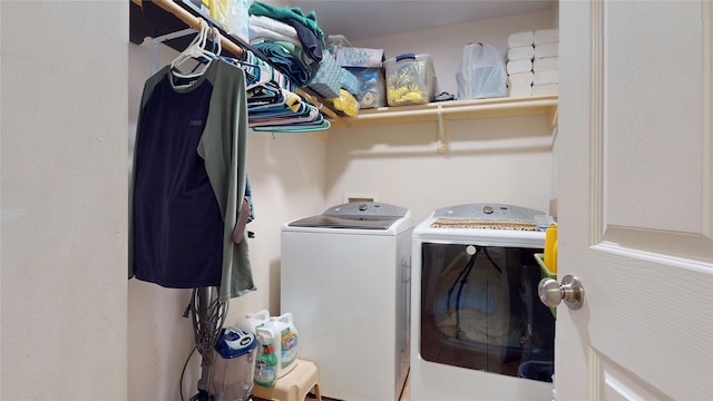 laundry area with laundry area and washer and dryer