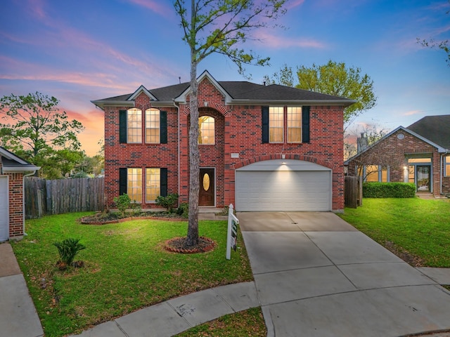 13619 Bonilla Ln, Houston, TX 77083 - view of front of house with driveway, fence, an attached garage, brick siding, and a front lawn