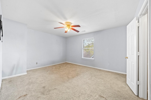 13619 Bonilla Ln, Houston, TX 77083 - unfurnished bedroom with baseboards, visible vents, carpet floors, and a ceiling fan