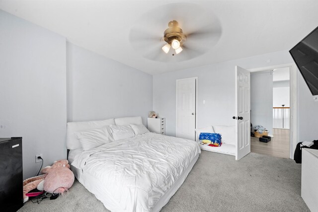 13619 Bonilla Ln, Houston, TX 77083 - bedroom with carpet floors and a ceiling fan