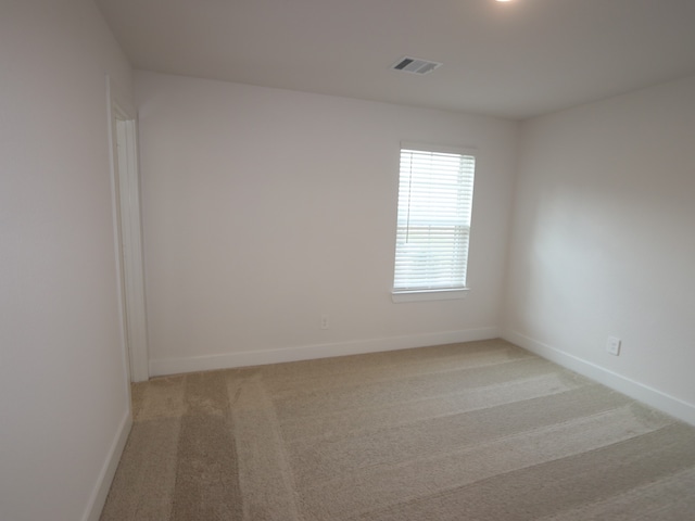 16208 Mcdonald County Ct, Montgomery, TX 77316 - empty room featuring light colored carpet and baseboards